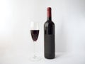 Red wine in a glass on white background