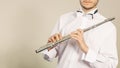 Flute music instrument in hands of flutist musician Royalty Free Stock Photo