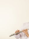 Flute music instrument in hands of flutist musician Royalty Free Stock Photo