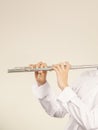 Flute music instrument in hands of flutist musician Royalty Free Stock Photo