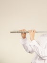 Flute music instrument in hands of flutist musician Royalty Free Stock Photo