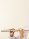 Flute music instrument in hands of flutist musician Royalty Free Stock Photo