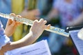 Flute music playing flutist musician performer with bright instrument