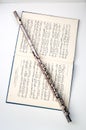 A flute on sheet music Royalty Free Stock Photo