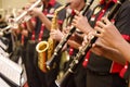 Flute, trumpet and saxophones orchestra perfom by high school bo Royalty Free Stock Photo