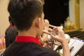 Flute, trumpet and saxophones orchestra perfom by high school bo Royalty Free Stock Photo