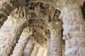 The fluted arches of massive stone columns in the Park of Guel Barcelona.