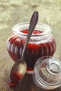 Fluted glass jar of strawberry jam Royalty Free Stock Photo