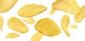 Fluted potato chips levitate on a white background Royalty Free Stock Photo