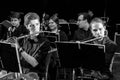 Flutists with musical instrument on stage