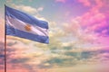 Fluttering Argentina flag mockup with the space for your content on colorful cloudy sky background Royalty Free Stock Photo