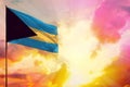 Fluttering Bahamas flag in top left corner mockup with the space for your text on beautiful colorful sunset or sunrise background