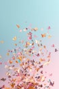 fluttering confetti against a pastel gradient background