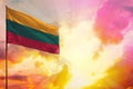 Fluttering Lithuania flag in top left corner mockup with the space for your text on beautiful colorful sunset or sunrise
