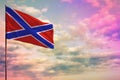 Fluttering Novorossiya flag mockup with the space for your content on colorful cloudy sky background