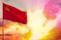 Fluttering Soviet Union SSSR, USSR flag in top left corner mockup with the space for your text on beautiful colorful sunset or