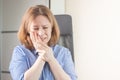 Flux, toothache, dental problems, a woman in the office with a toothache holds her cheek with her hand Royalty Free Stock Photo