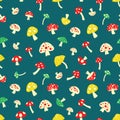 Fly agarics colored seamless pattern. Royalty Free Stock Photo