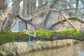 Fly box and fishing tackle on the river bank Royalty Free Stock Photo