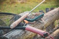 Fly box and rod on the river bank. Fly fishing Royalty Free Stock Photo