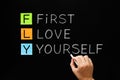 FLY - First Love Yourself Acronym Concept Royalty Free Stock Photo