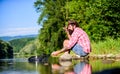 fly fish hobby. Summer activity. successful fisherman in lake water. mature bearded man with fish on rod. big game Royalty Free Stock Photo