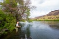 Fly Fisherman Casting on the Deschutes River Royalty Free Stock Photo