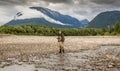 A fly fisherman on the Skeena River near Terrace, in British Columbia, Canada