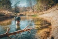 Fly fishing on a forest river background Royalty Free Stock Photo