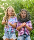 Fly fishing. Kids spend time together fishing. Fishing skills. Summer hobby. Happy smiling children with net and rod Royalty Free Stock Photo