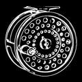 Fly fishing reel on black background