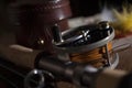 Fly fishing rod and reel with leather case and feather flies. Royalty Free Stock Photo