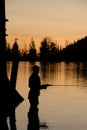 Fly Fishing silhoutette Royalty Free Stock Photo