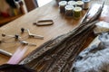 Fly Fishing Still Life. Materials and tools for tying lures on a wooden table. Hobby concept. Royalty Free Stock Photo