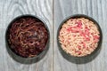 Fly larvae and compost worms in open fishing boxes on a wooden rustic background.