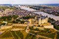 Fly over picturesque town of Saumur and medieval castle Saumur. France Royalty Free Stock Photo