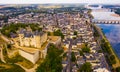 Fly over picturesque town of Saumur and medieval castle Saumur. France Royalty Free Stock Photo