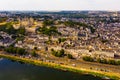 Fly over picturesque town of Saumur and medieval castle Saumur. France Royalty Free Stock Photo