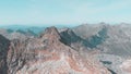 Fly over rocks and peaks high in the mountains. View of the mountains and Mountain