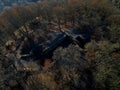 fly over ruins of castle where only cellars are visible in the sky.