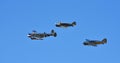 Fly past by 2 Spartan Executives and a Beech 3TM Model 18 Aircraft with blue sky background.