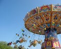Fly in the sky - small colourful carousel Royalty Free Stock Photo