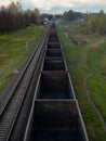 Fly view of railway tracks and empty freight train Royalty Free Stock Photo