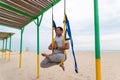 Fly Yoga, man doing yoga exercises on the sea background. Sport and healthy concept Royalty Free Stock Photo