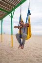 Fly Yoga, man doing yoga exercises on the sea background. Sport and healthy concept Royalty Free Stock Photo