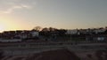 Flyaway drone footage of a shingle beach at sunset in Felixstowe, Suffolk