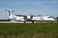 Flybe Bombardier DHC-8 Q400 G-KKEV passenger plane taxiing at Amsterdam Schipol Airport Royalty Free Stock Photo