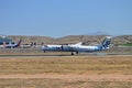 Flybe Propeller Plane One Wheel Touchdown Royalty Free Stock Photo