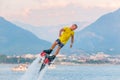 Flyboard performer in the air during an event Royalty Free Stock Photo
