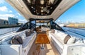 The flybridge is awash with natural light and offers comfortable seating area Royalty Free Stock Photo